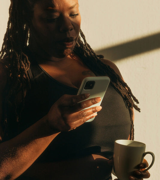 Black mom working out and practising self-care