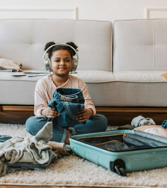 a child of color listening to kids podcast